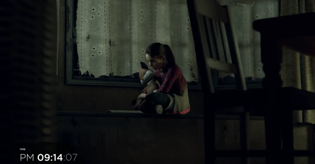 Girl hugging stuffed toy beside window indoors