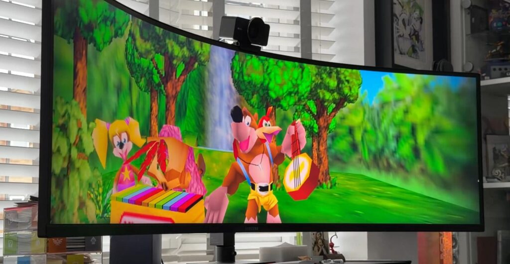 Banjo-Kazooie playing guitar beside Tooty in forest