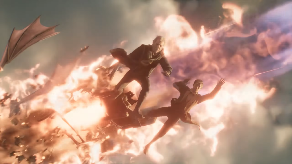 Two people falling from burning wreckage in sky