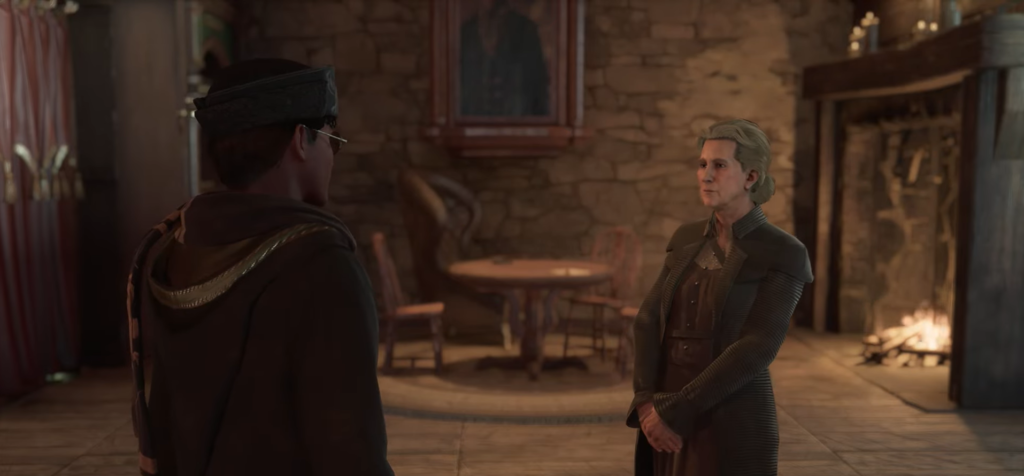 Two people talking in a stone room by fireplace