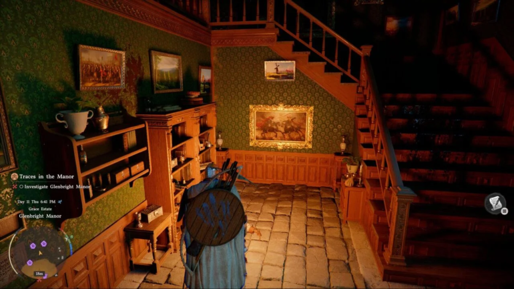 Hogwarts Legacy player walks inside manor staircase hall