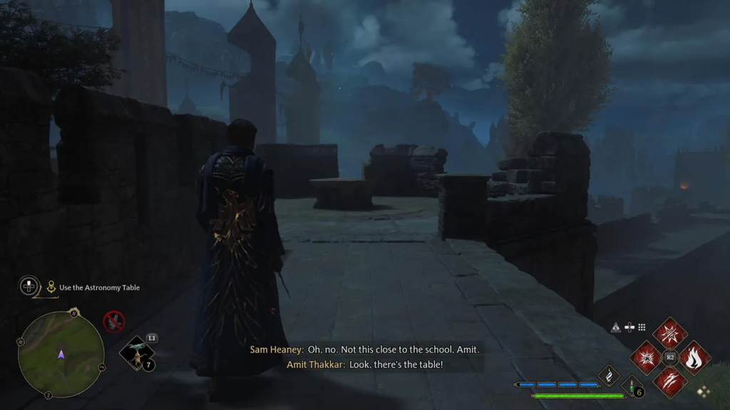 Player character walking on Hogwarts castle ramparts at night