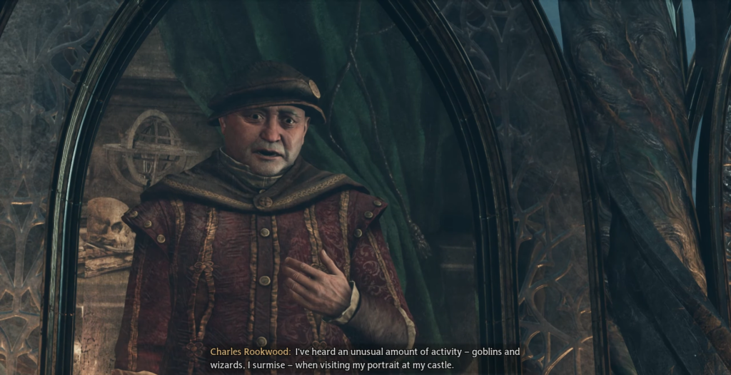 Charles Rookwood speaks inside ornate castle portrait frame