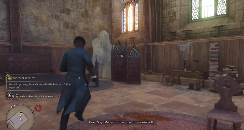 Hogwarts Legacy player runs inside stone-walled room