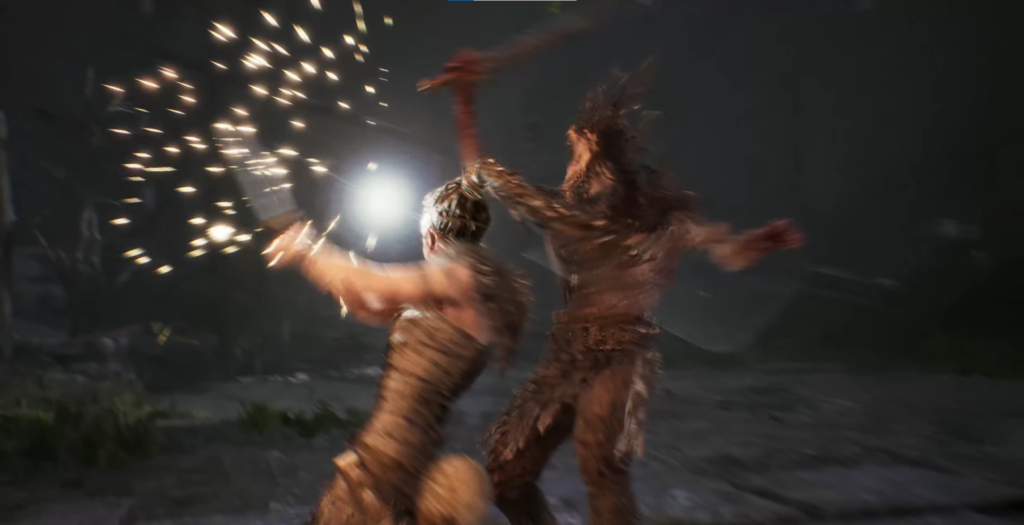 Warrior fights monster with sword in dark cave