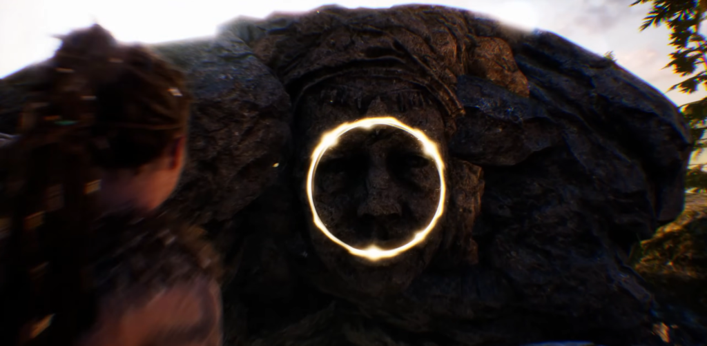 Woman faces giant rock creature with glowing ring