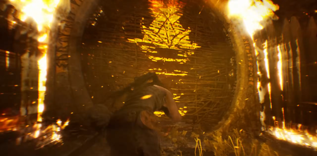 Person crawling toward glowing circular door in fire