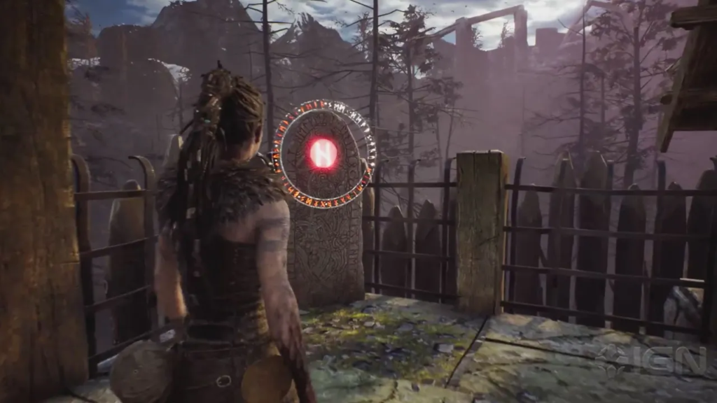 Senua approaches glowing rune stone in wooden fort courtyard