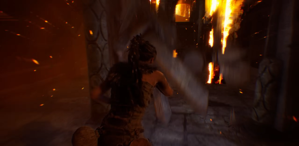 Woman runs through burning stone corridor with sparks