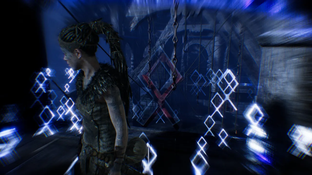 Senua stands amid glowing runes in Hellblade: Senua's Sacrifice