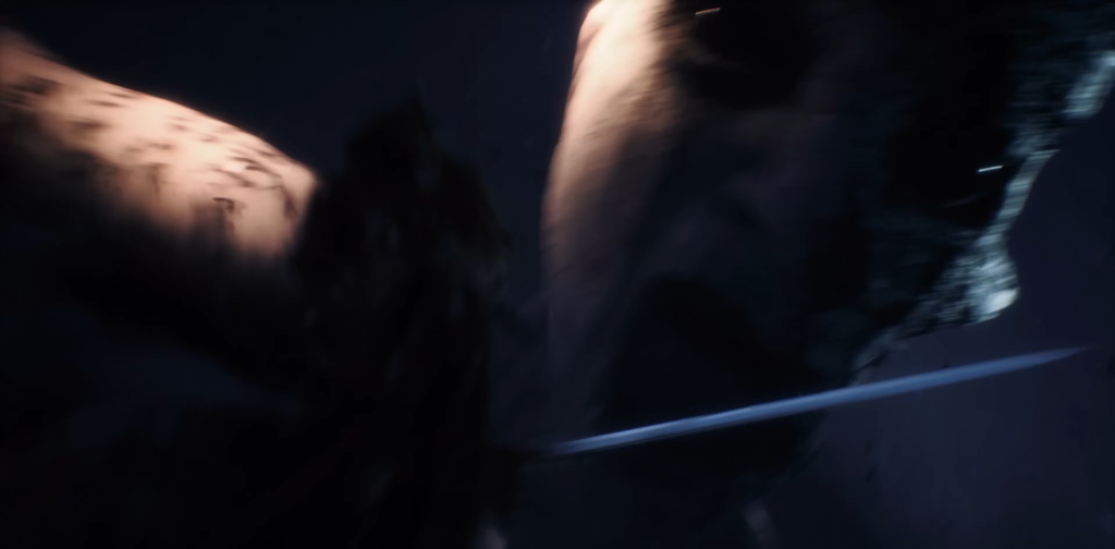 Blurred person falling in dark water