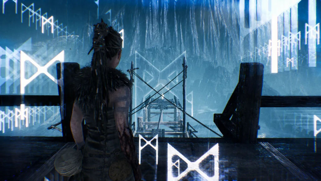 Senua stands on wooden platform in rain, Hellblade