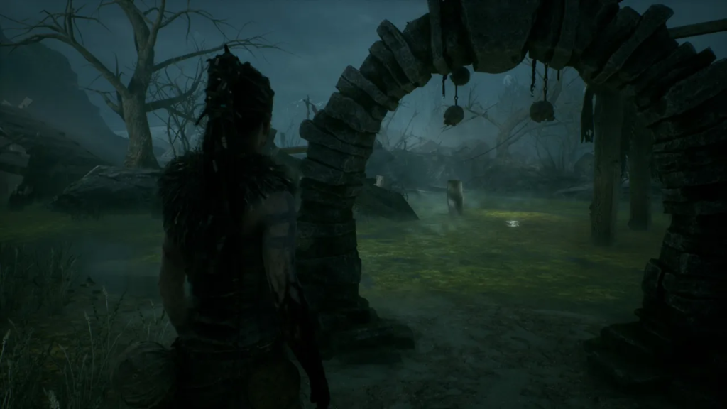 Warrior stands by stone arch in foggy swamp