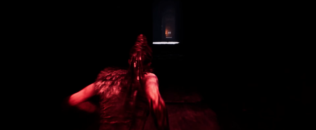 Woman running toward lit doorway in dark corridor