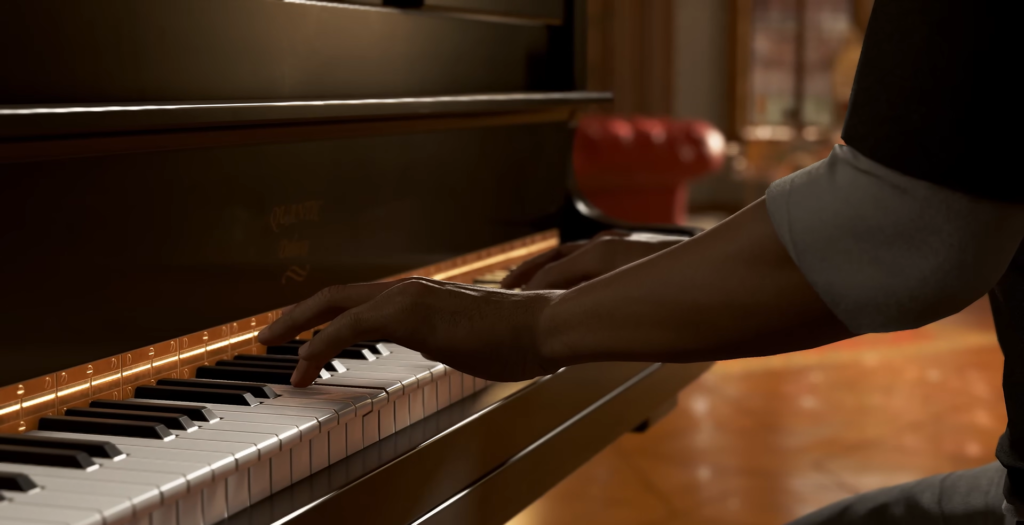 Hands playing piano keys in living room