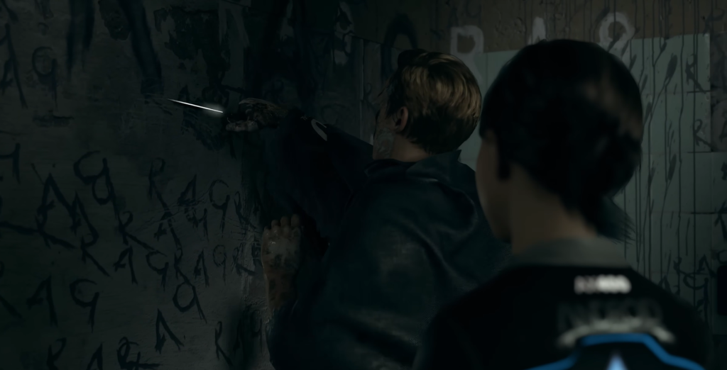 Man presses ear to graffiti wall indoors