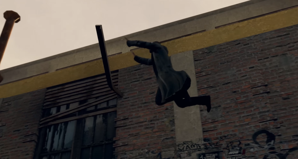 Person falling from brick building wall outdoors