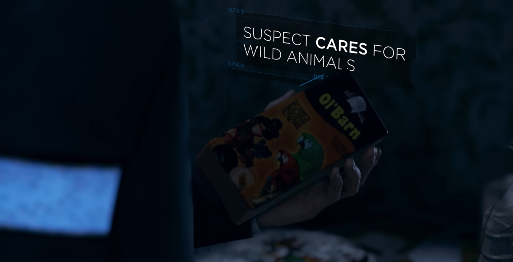 Hand holding bird food container with parrots label