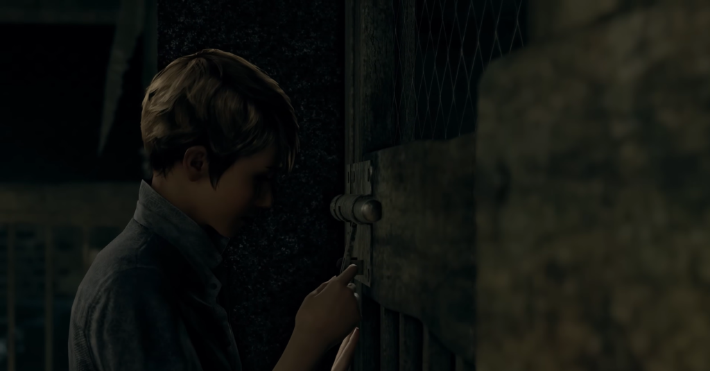Boy unlocking metal door with key indoors