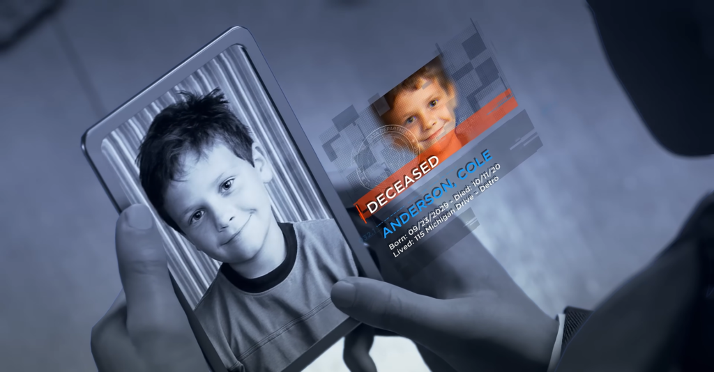 Hands holding tablet showing deceased Anderson Cole profile