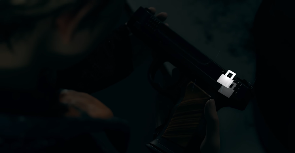 Hands holding black pistol in dark setting