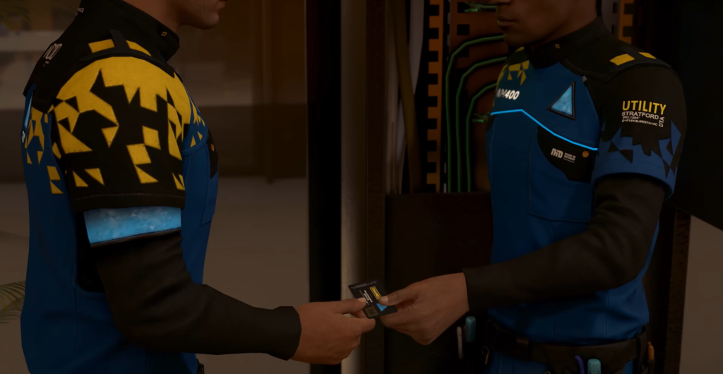 Two workers exchange keycard in utility room