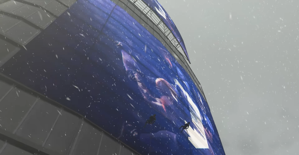 Workers rappel beside blue billboard on curved building in snow