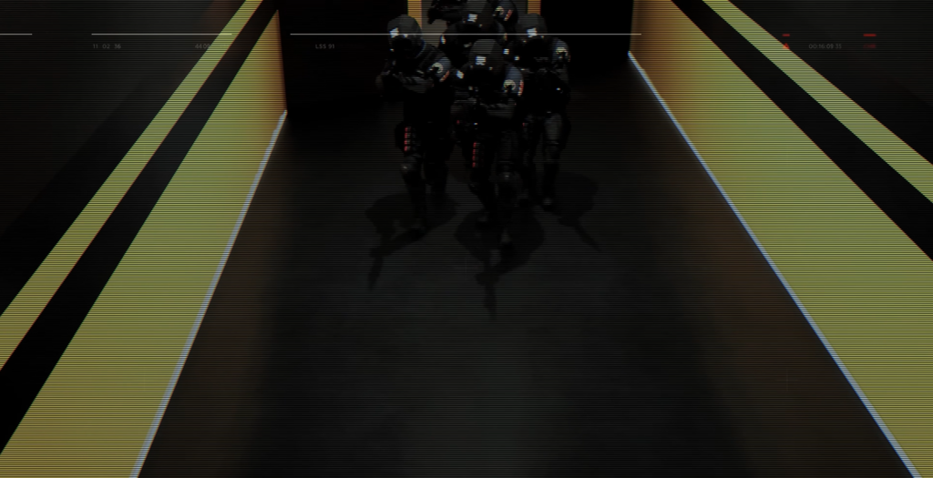 Armored soldiers running down dark corridor with yellow lines