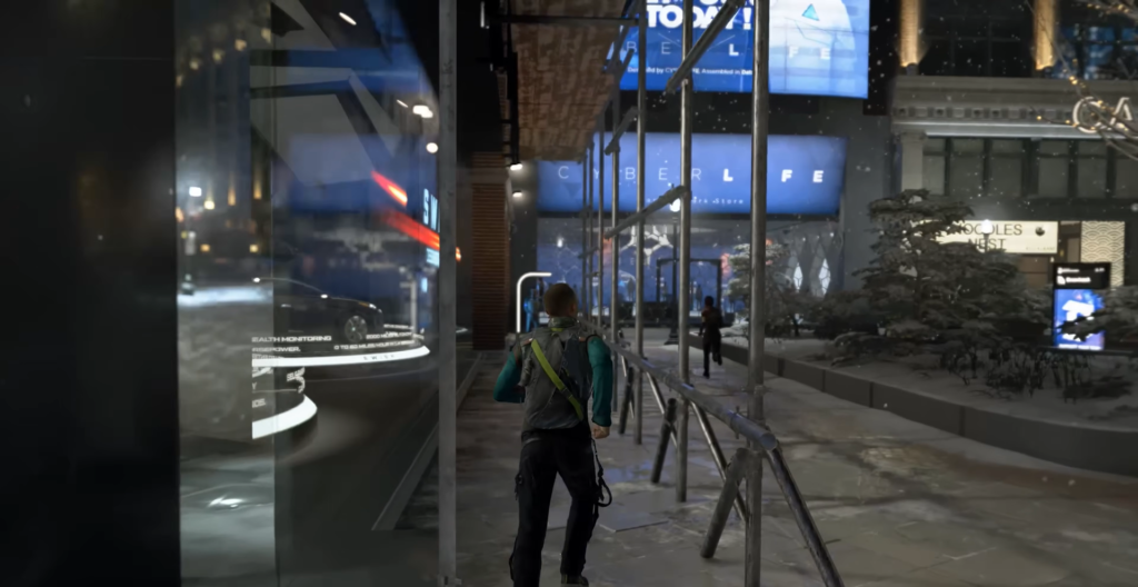 Person walking on snowy city sidewalk at night