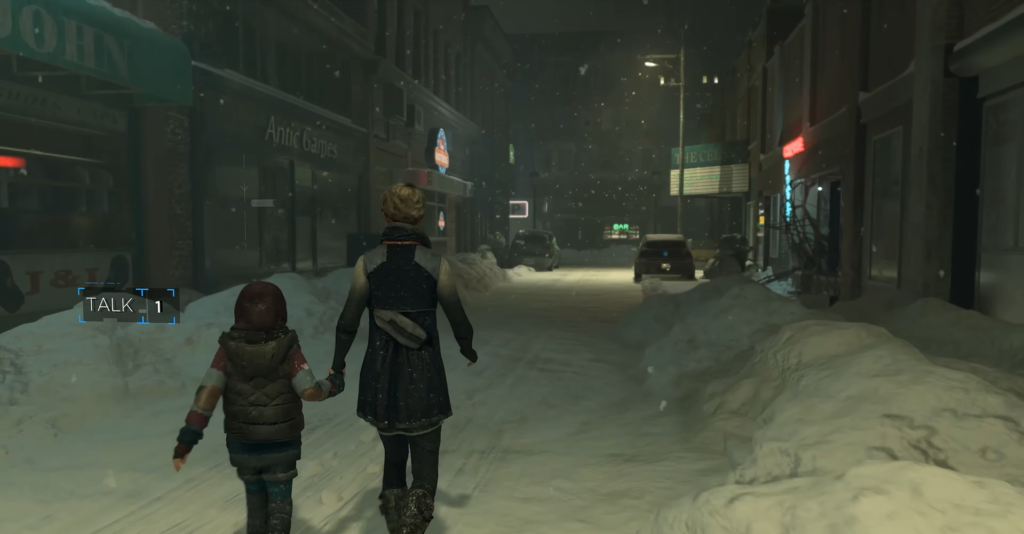 Woman and child holding hands on snowy street