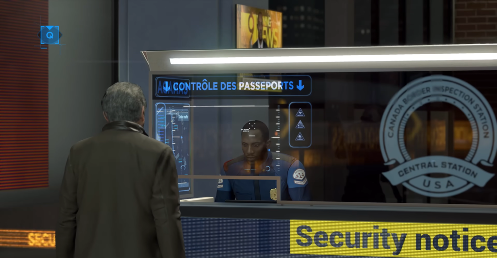 Man speaks to officer at passport control desk