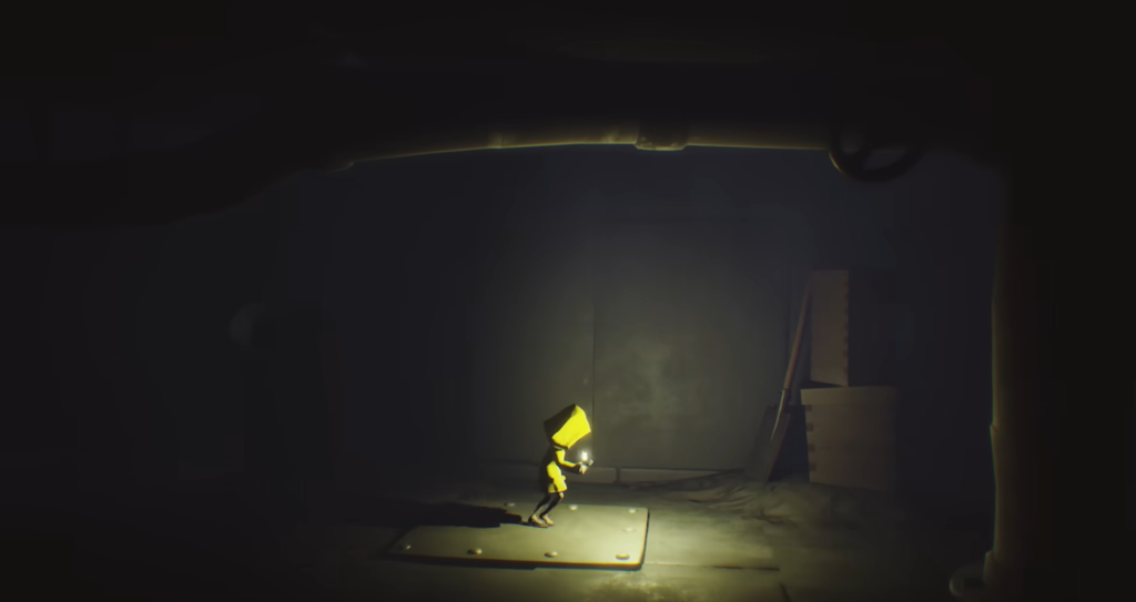 Six from Little Nightmares holding lighter in dark room