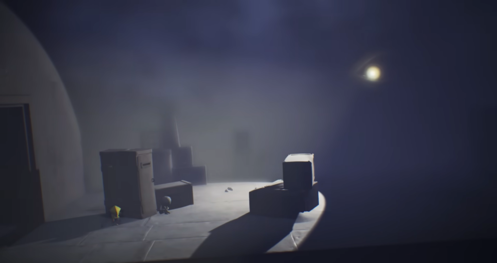 Little Nightmares Six crouches beside boxes in dim room