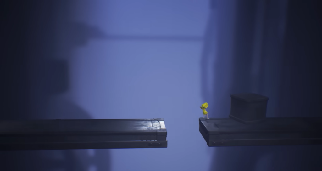 Six from Little Nightmares standing on platform edge