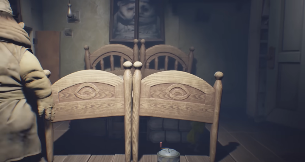 Wooden twin beds in dim bedroom interior