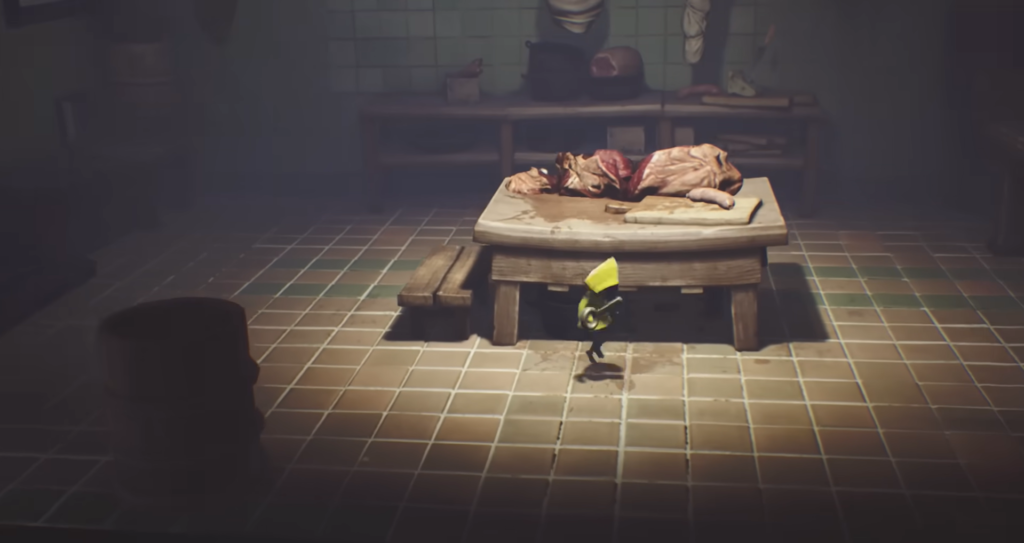 Six from Little Nightmares walks past butcher table