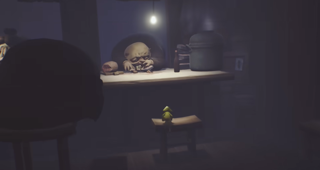 Six from Little Nightmares stands on stool in kitchen