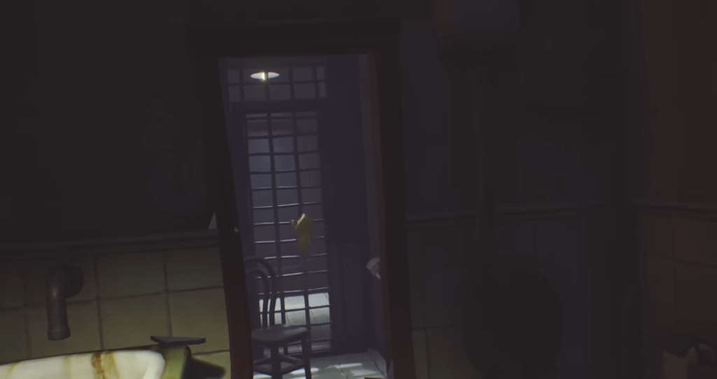 Yellow raincoat figure climbing barred door in bathroom