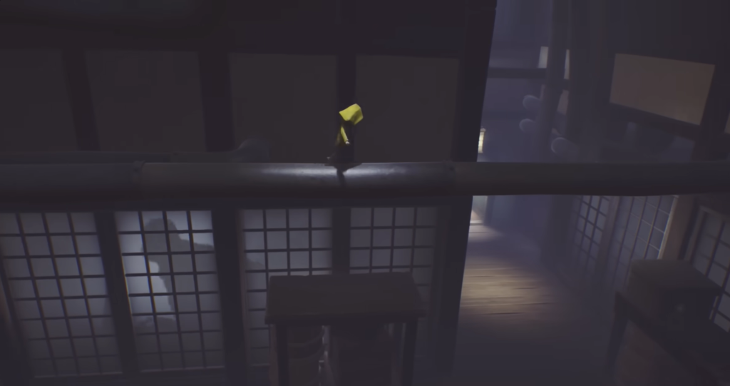 Six from Little Nightmares walking on pipe indoors
