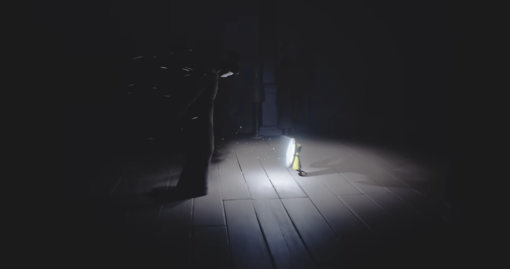 Little Nightmares Six holding lighter in dark hallway