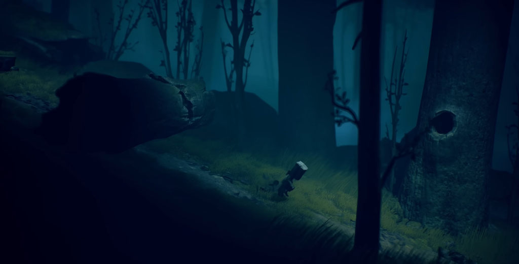 Small figure walking through blue foggy forest