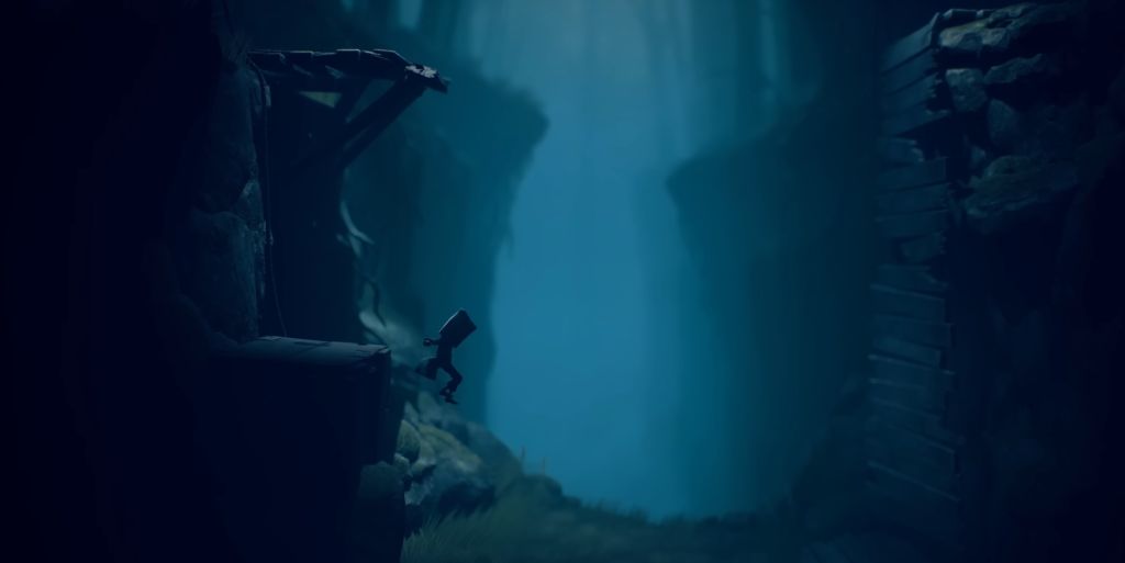 Hooded figure jumps across cliff in blue canyon