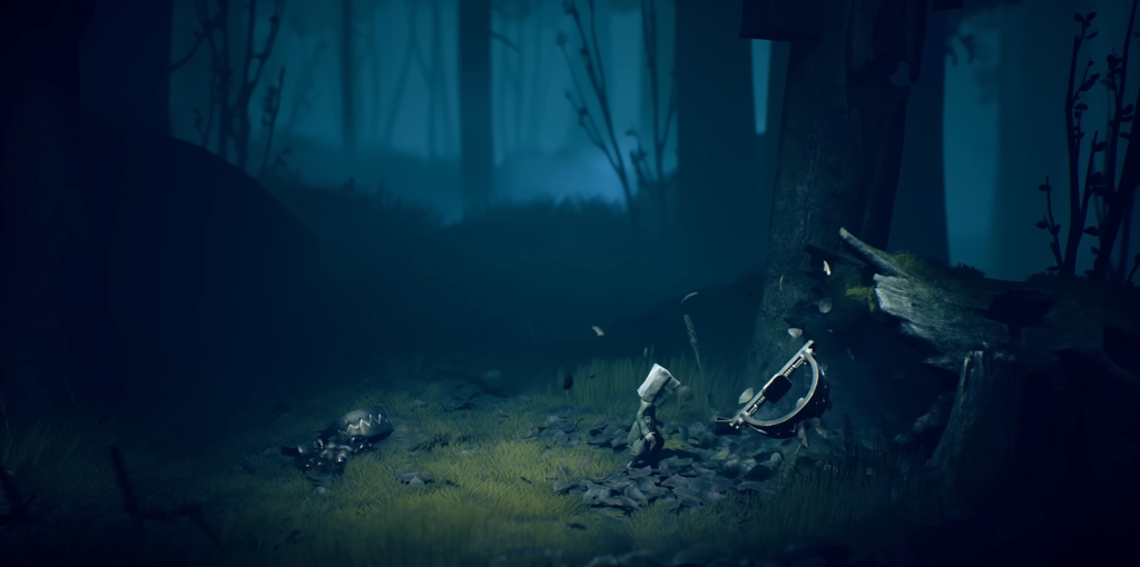 Little Nightmares II Mono walks through dark forest