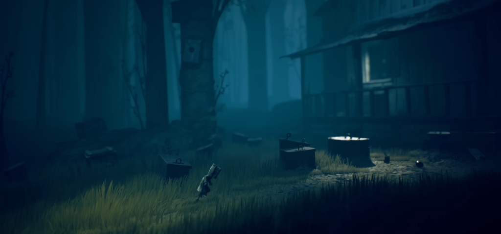 Little Nightmares character walks through dark forest clearing