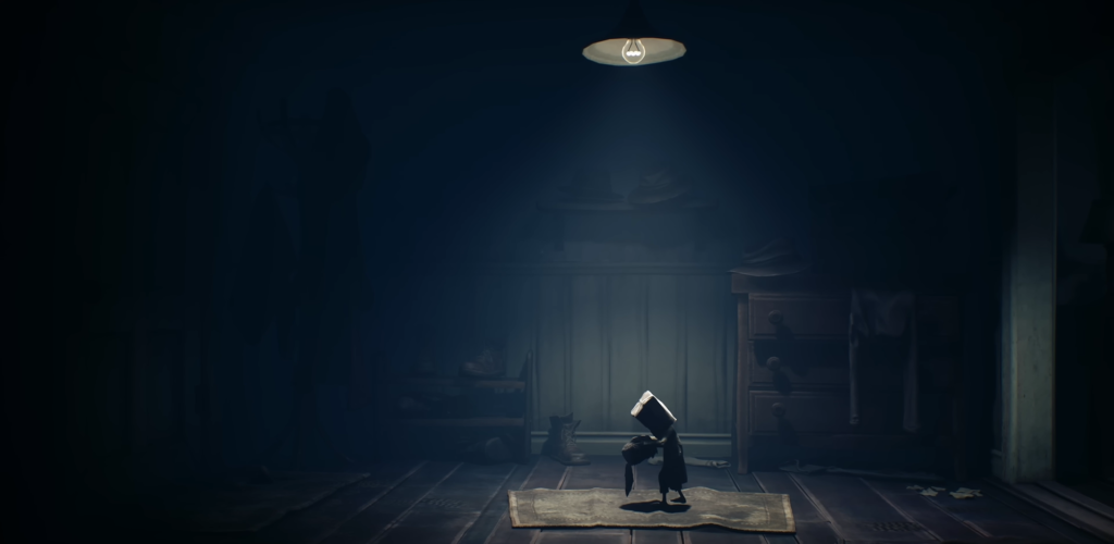 Little Nightmares Six stands under lamp in room