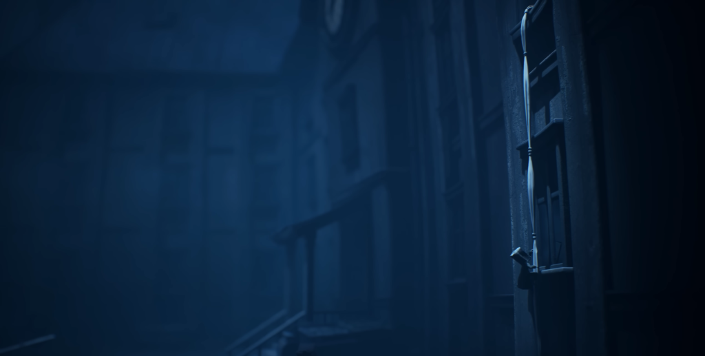 Blue foggy alley with building facade and pipes