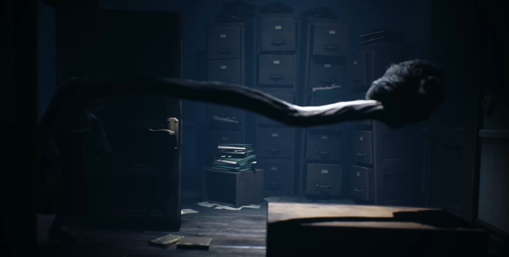 Long arm reaching across office with filing cabinets