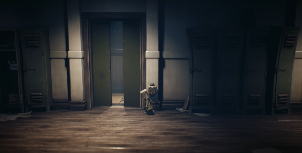 Little Nightmares character hiding by door in hallway