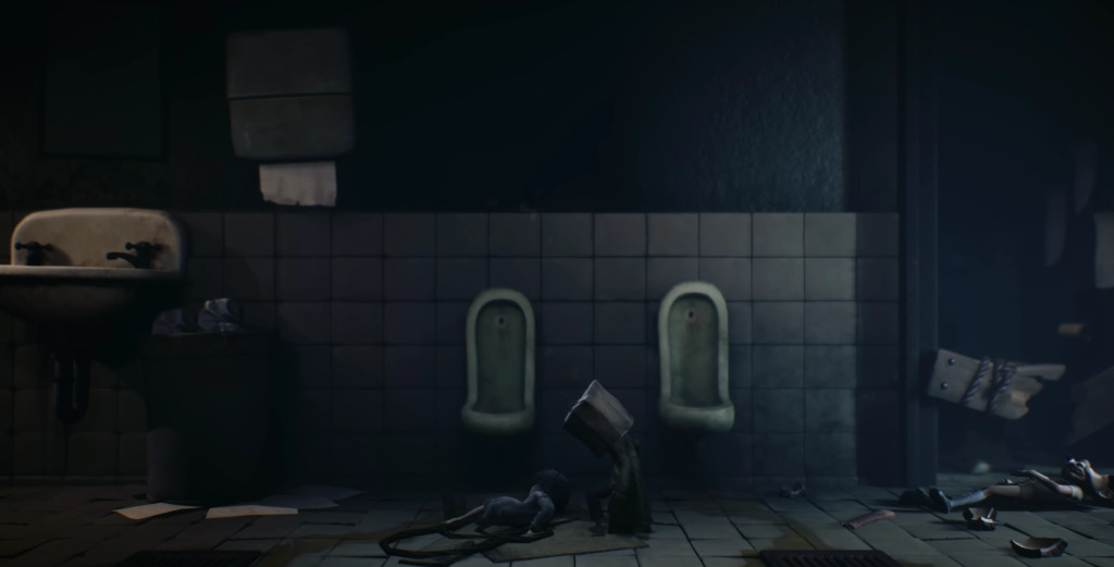 Six from Little Nightmares crouches in tiled bathroom