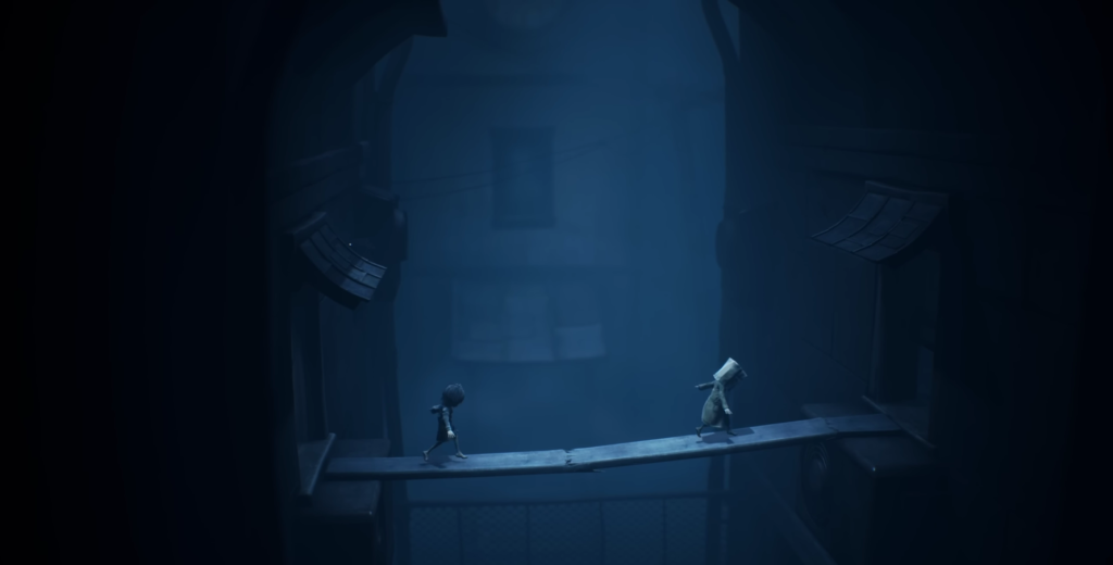 Six and Mono walking on narrow bridge in Little Nightmares